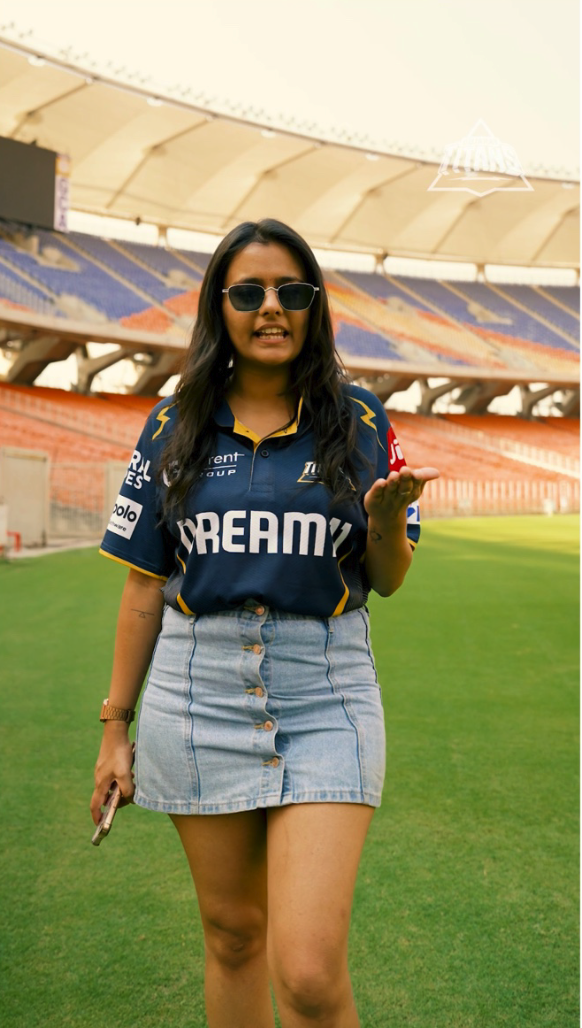 Presenter filming inside the stadium stands