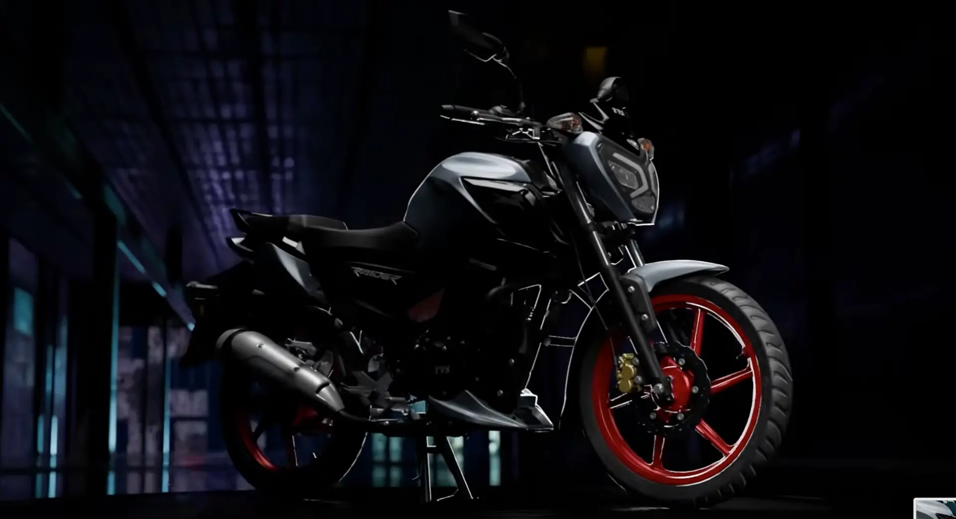 TVS Raider motorcycle hero side profile in low key lighting
